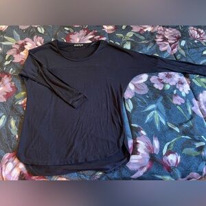 Cotton: On dark blue long sleeve blouse. Size XXS